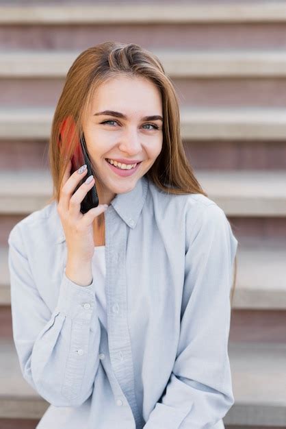 Free Photo Smiling Blonde Woman Talking On Phone