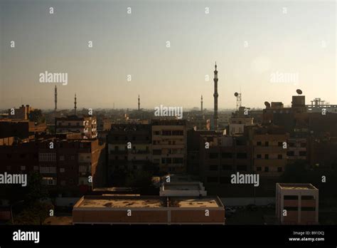 Luxor city skyline, rooftops and mosque minarets at dusk, Egypt Stock ...