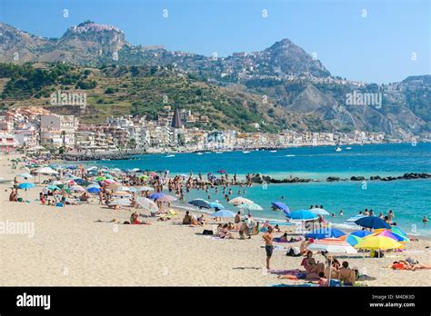 Beach in Giardini Naxos, Sicily Stock Photo - Alamy