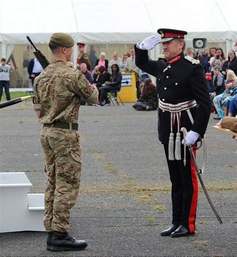 The Lord Lieutenant Salutes Cadet Regimental Sergeant Major Teddy Huk