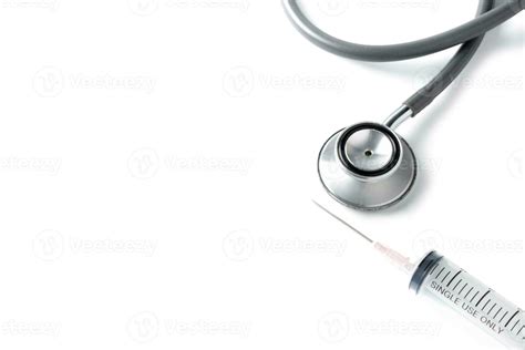 Stethoscope And Hypodermic Syringe Isolated On White 23311111 Stock