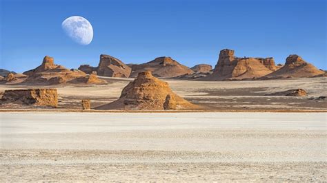 Dasht E Lut Kalut Desert Rocks With Full Moon Above Horizon Iran