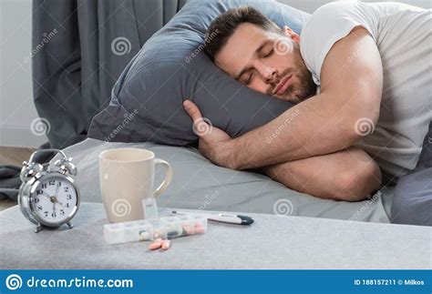 Sick Man Sleeping Having Fever Lying In Bed At Home Stock Image Image