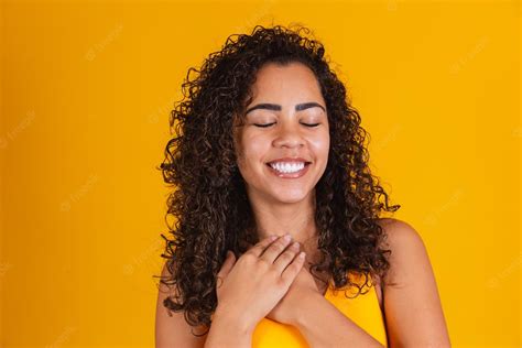 Premium Photo Black Woman Happy Grateful Hopeful Holding Hands On