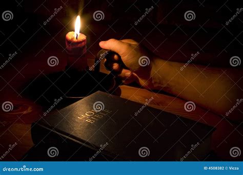 The bible by candle light stock photo. Image of christianity - 4508382