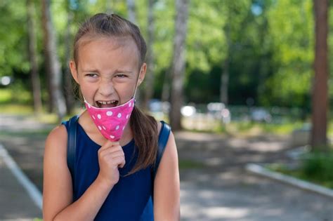 Premium Photo Portrait Of Cute Girl Holding Ice Cream