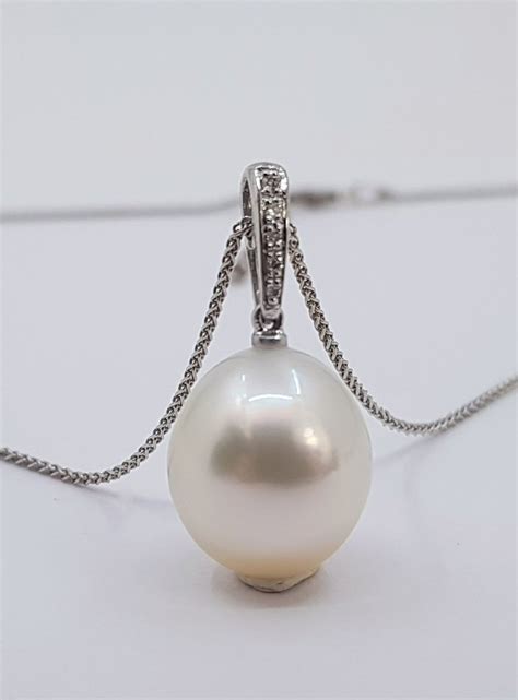 13 4mm Vibrant White Australian South Sea Pearl 0 04ct 14 Karaat