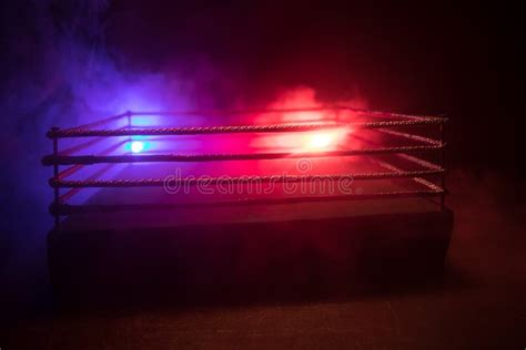 Empty Boxing Ring With Red Ropes For Match In The Stadium Arena