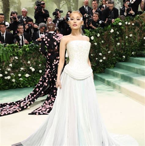 Ariana Grande Makes Her Met Gala Return In A Bridal Inspired Loewe Gown