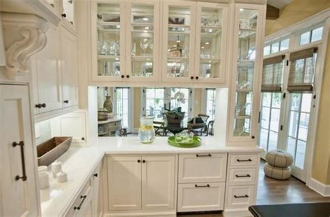 Decorating With Glass Cabinets Doors Brings Light Into Modern Kitchen Designs