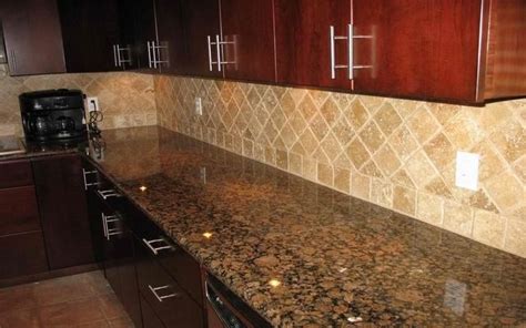 Baltic brown granite countertops with light tan backsplash...would look ...