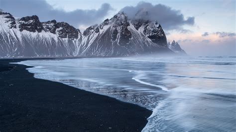 Black Sand Beach At Stokknes In Front Of The Vestrahorn Mountain Range