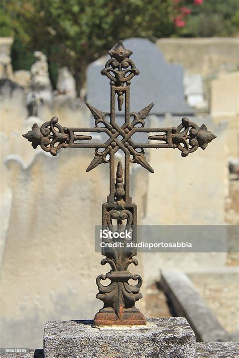 Tombstone With Cross Ornament At A French Cemetery Stock Photo