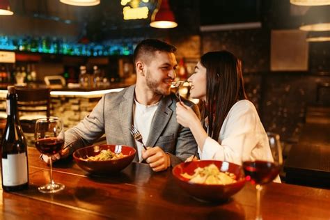 Premium Photo Love Couple Flirting At Wooden Bar Counter Romantic Dinner With Paste And Red Wine