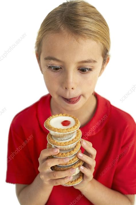 Greedy Girl Stock Image F001 2483 Science Photo Library