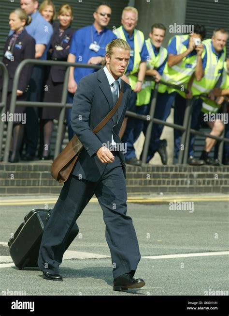 England captain David Beckham walks to the British Airways flight at ...