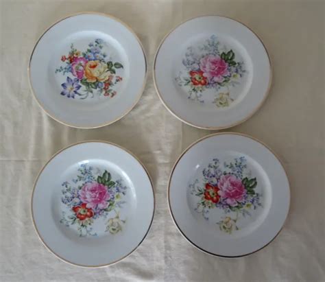 4 ASSIETTES PLATES porcelaine de Limoges décor fleurs 325112 EUR 18 00