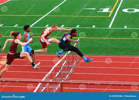 Boys Competing In Hurdles At A Track Competition Editorial Stock Photo ...