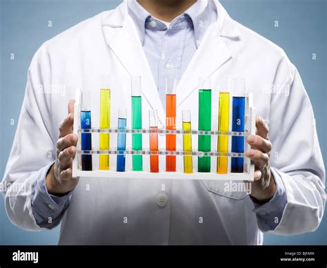 Scientist Holding Test Tubes Stock Photo Alamy