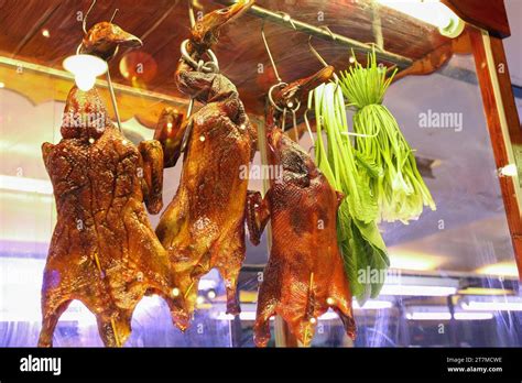 Roasted Ducks Peking Duck Are Displayed In Restaurant Windows Of