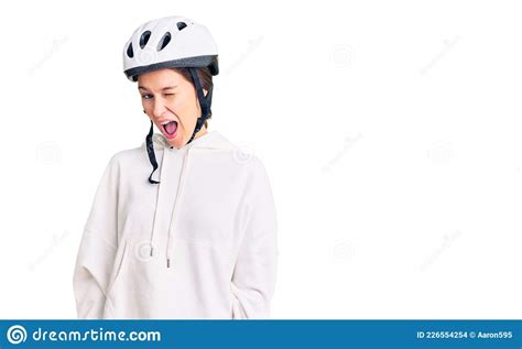 Beautiful Brunette Young Woman Wearing Bike Helmet And Sporty Clothes