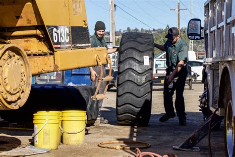 Industrial Tire Installation on Cat Scraper - Complete Step by Step Install