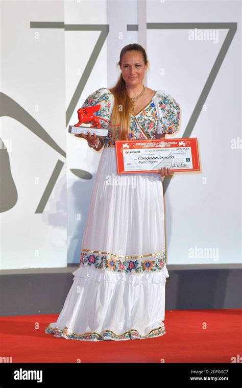 Director Ana Rocha De Sousa Posing With The Lion Of The Future Luigi