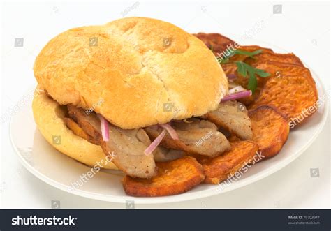 Peruvian Sandwich For Breakfast Called Pan Con Chicharron With Fried