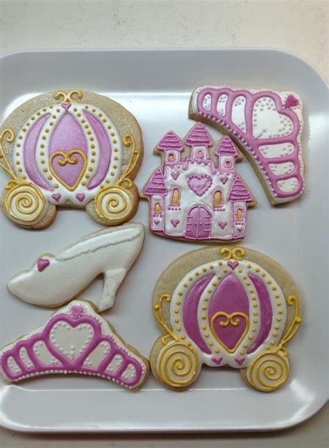 Decorated Cookies In The Shape Of Princess S Castle And Carriages