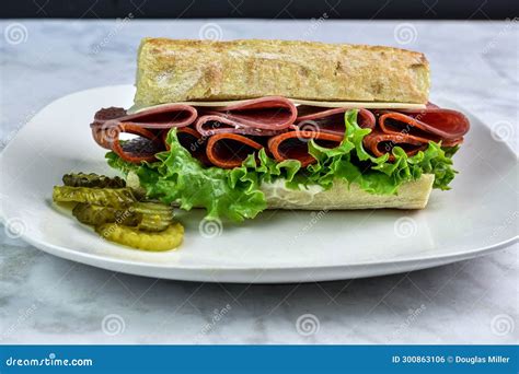 Salami And Pepperoni On Ciabatta Bread With Pickles Stock Photo Image