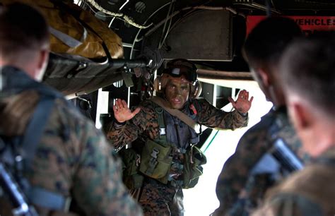 Marine Corps Gunnery Sgt Shawn D Decker Signals His Marines To Guide