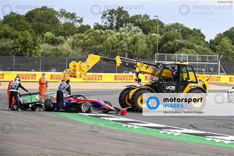 Damaged Car Of Oliver Caldwell Gbr Trident Being Recovered Silverstone Motorsport Images