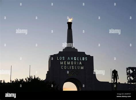 The Los Angeles Memorial Coliseum Peristyle And The Olympic Torch