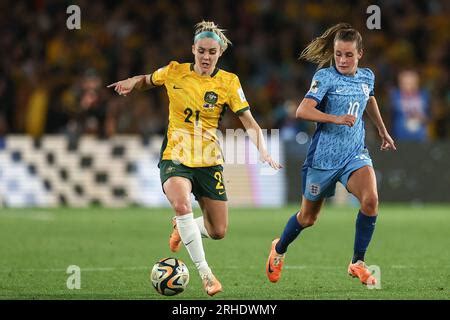 Ellie Carpenter Of Australia Holds The Ball As Ella Toone Of