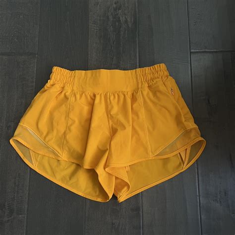 Lululemon Neon Orange Hotty Hot Shorts Size 4 Depop
