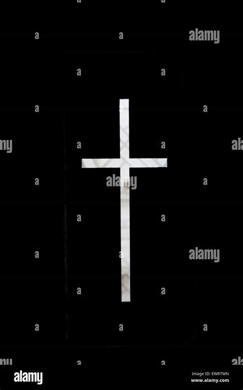 White Cross on black background Stock Photo - Alamy