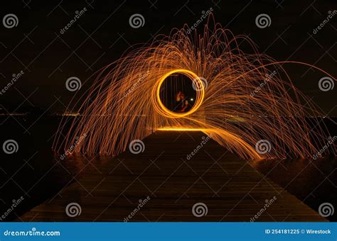 Long Exposure Light Painting On The Boardwalk On A Lake Stock Image