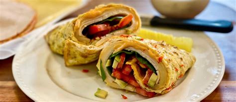 Low Carb Omelet Wrap With Turkey Swiss And Sriracha Mayo Joy Bauer