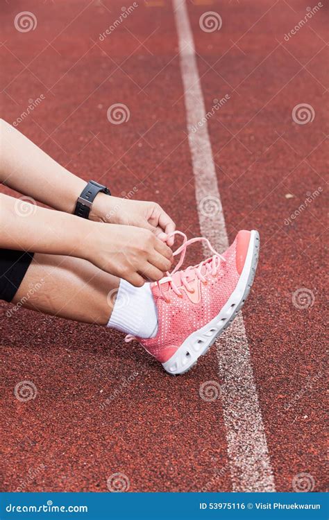 Young Woman Runner Tying Shoelaces Stock Photo Image Of Asian Health