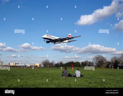 A British Airways Airbus A380 Lands Over Plane Spotters At Heathrow