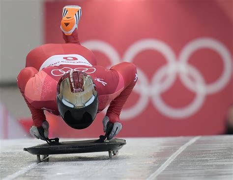 Skeleton athletes are wearing some very cool helmets