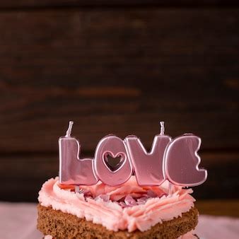 Free Photo | Close-up of cupcakes with heart-shaped sprinkles