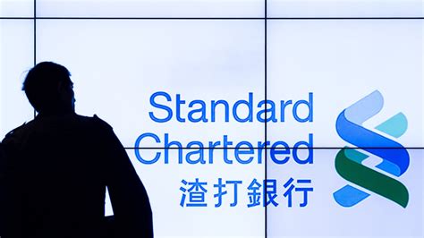 Standard Chartered Shares Sink On Shock Quarterly Loss Bbc News