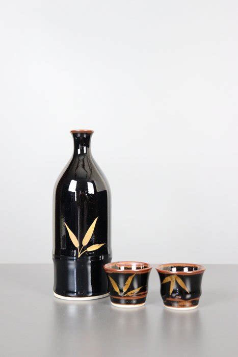 Vase A Black Porcelain Sake Pitcher And Two Sake Cups Catawiki