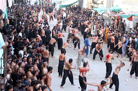 Mourners Oozing Themselves With Knives And Chain During Procession On