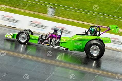 Speeding Green Dragster On A Drag Strip Editorial Photography Image