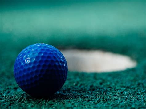 Golf Ball Green Sports Fun Blue Hole Golf Ball Close Up