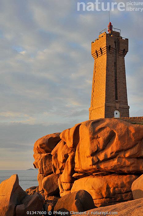 Stock Photo Of The Pors Kamor Lighthouse At Sunset Along The Cote De