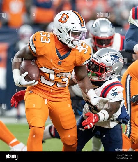 Denver, Colorado, USA. 24th Dec, 2023. Broncos RB JAVONTE WILLIAMS runs