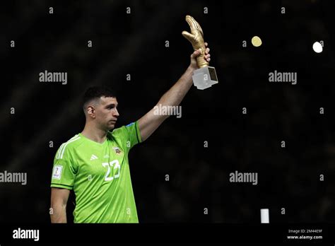 Al Daayen Argentina Goalkeeper Damian Martinez With The Trophy For